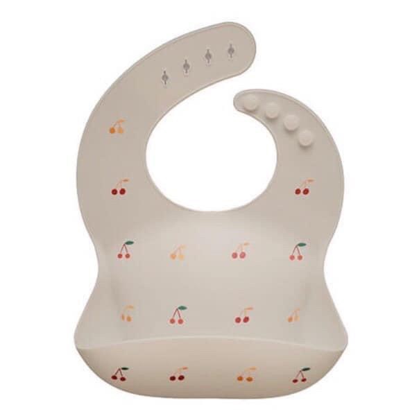 Mushie Yếm Silicone Cherry nền Beige